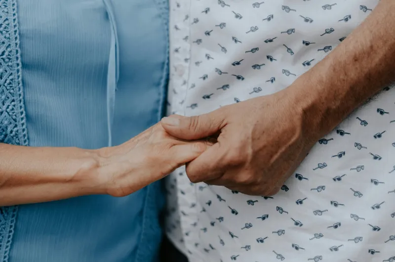 Healthcare professional warmly engaging with a patient to provide personalised allied health care